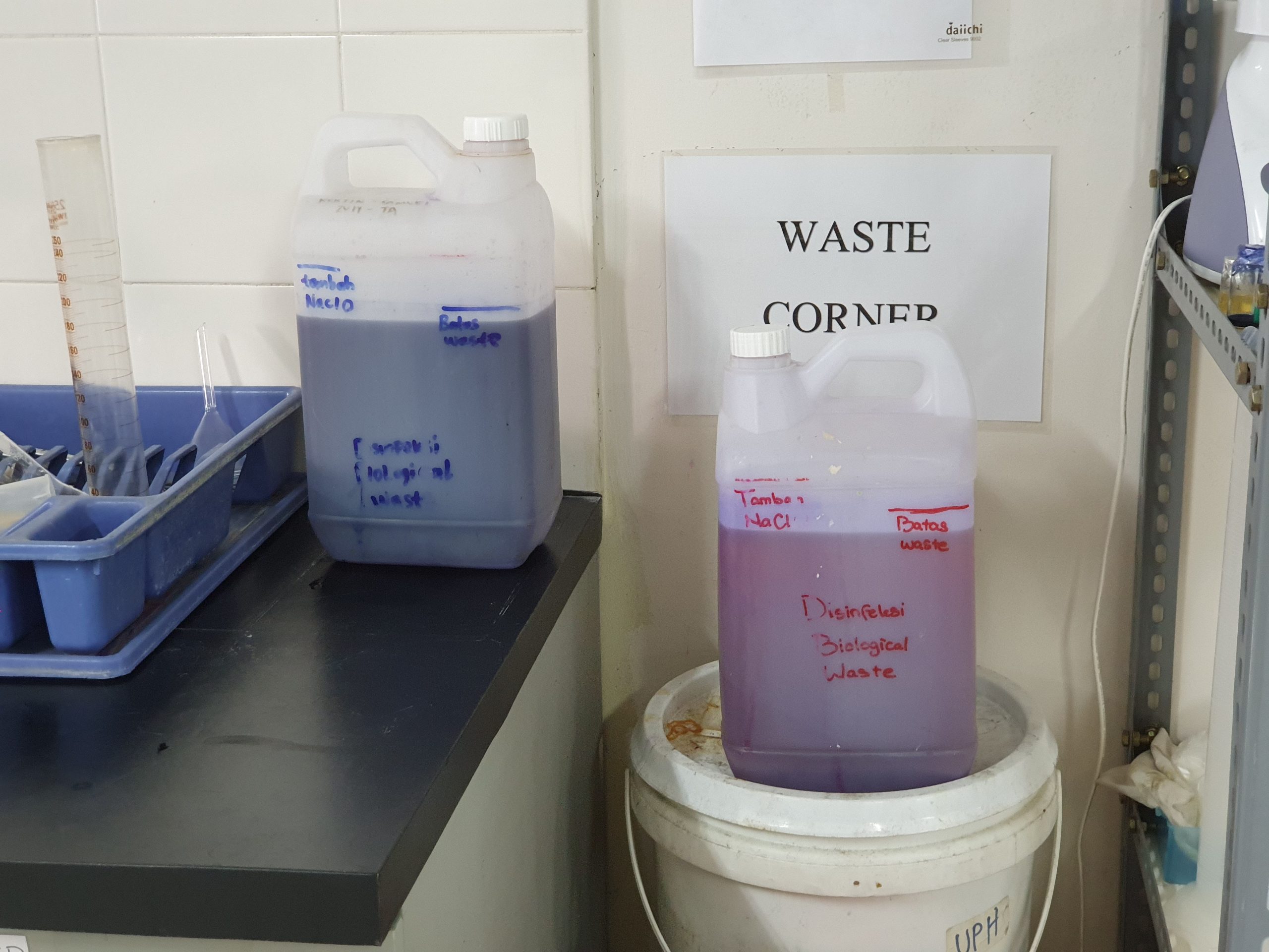 Containers for laboratory waste disposal